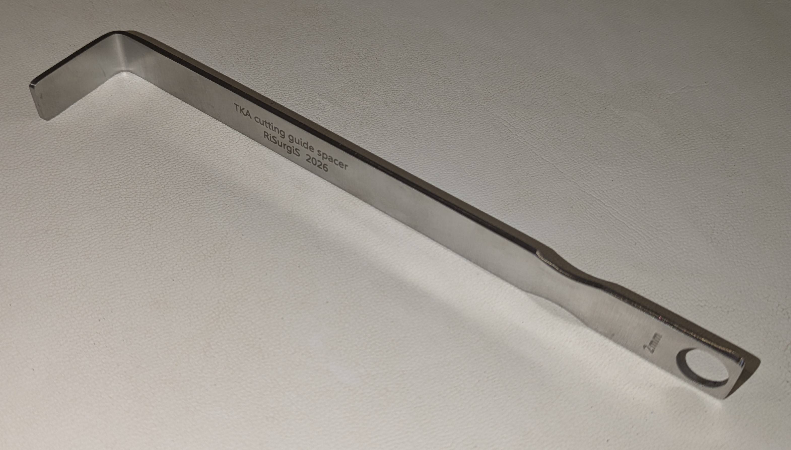 Finished TKA cutting guide spacer — piece 1