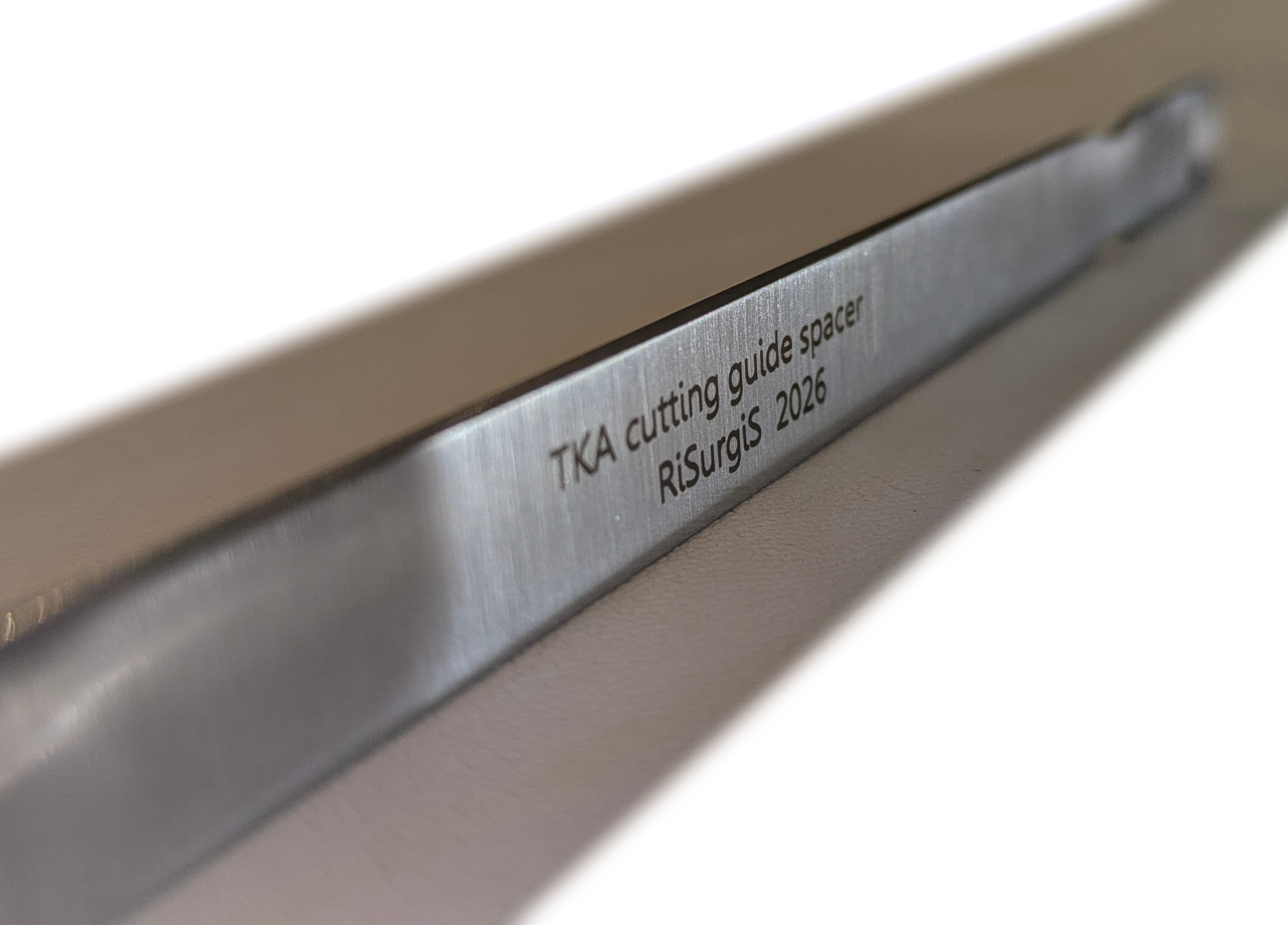 Finished TKA cutting guide spacer — piece 4